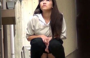 Chinese young womans urinate squatting